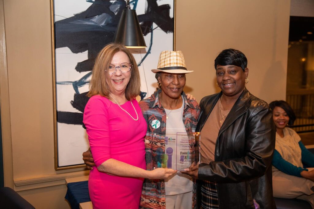 Ellen Reddy (center) received the award for Valuing Every Child and Family.